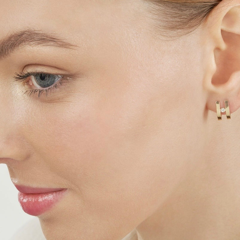 Double j hoop with bezel diamond center