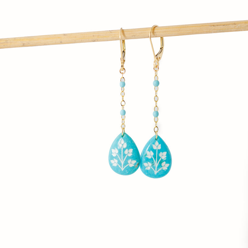 Carved turquoise teardrop dangle earrings